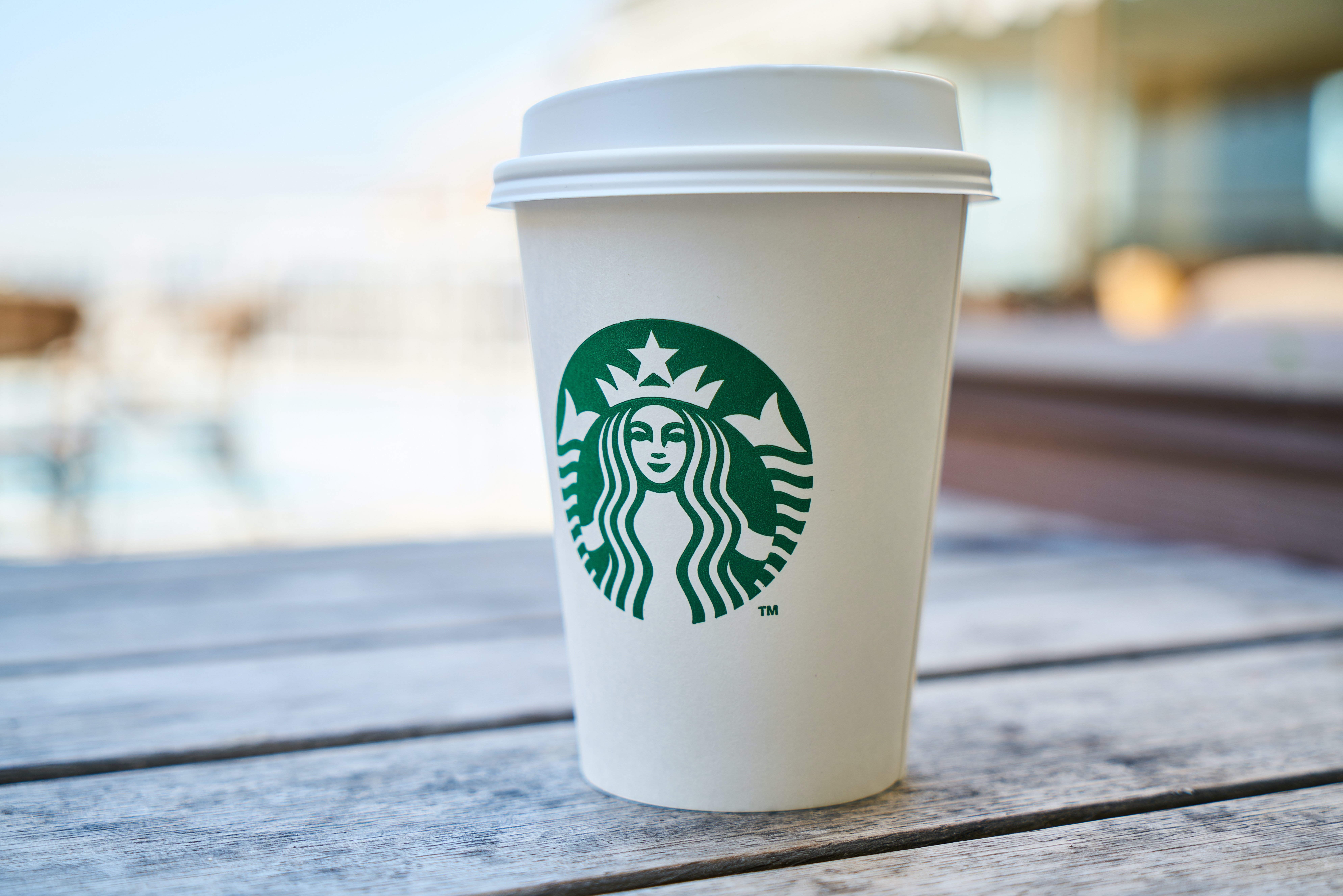 closed-white-and-green-starbucks-disposable-cup-efundamentals-blog